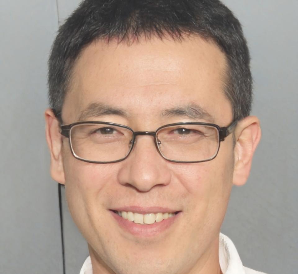 Instructor reviewing design work with student